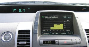 Dashboard showing hybrid car battery regeneration system, indicating battery performance and energy recovery in hybrid vehicles.