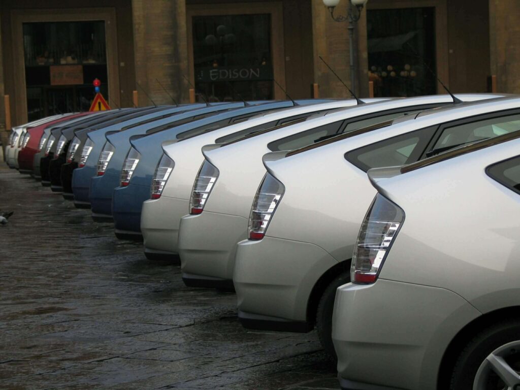 Row of parked Toyota Prius hybrid cars